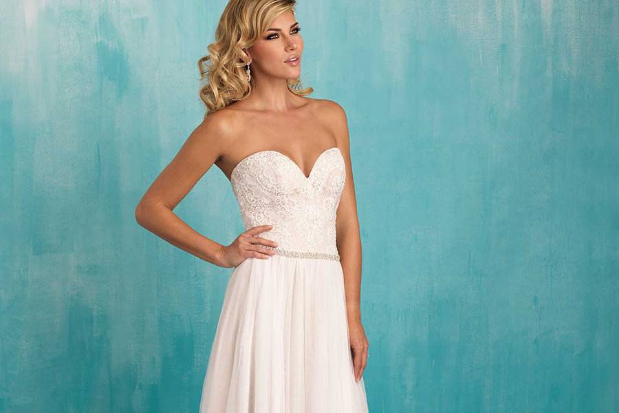 Style 9324 <br> We envision this strapless gown at the dreamiest of destination weddings.