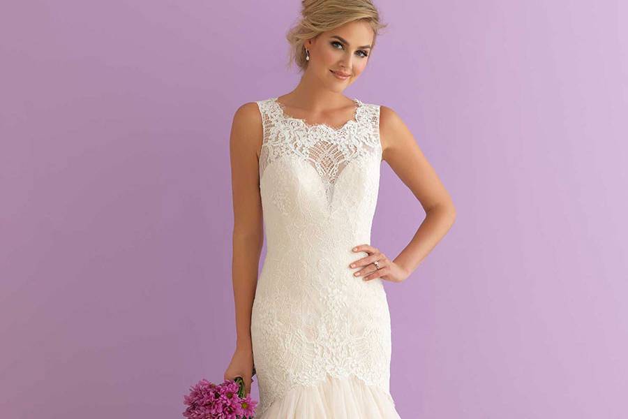 Style 2911 <br> Whispers of lace and ethereal tulle forge an undeniably feminine blend of textures.