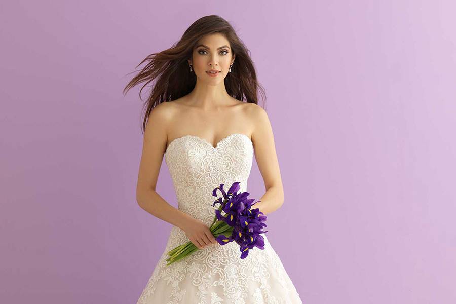 Style 2900 <br> We adore the dreamy layers of tulle that make up this floating skirt.