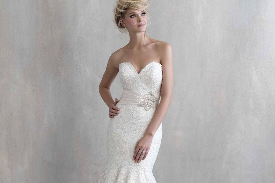 Style MJ209 <br> Delicate tulle is ruched and sprinkled with Swarovski crystal beading at the bodice.