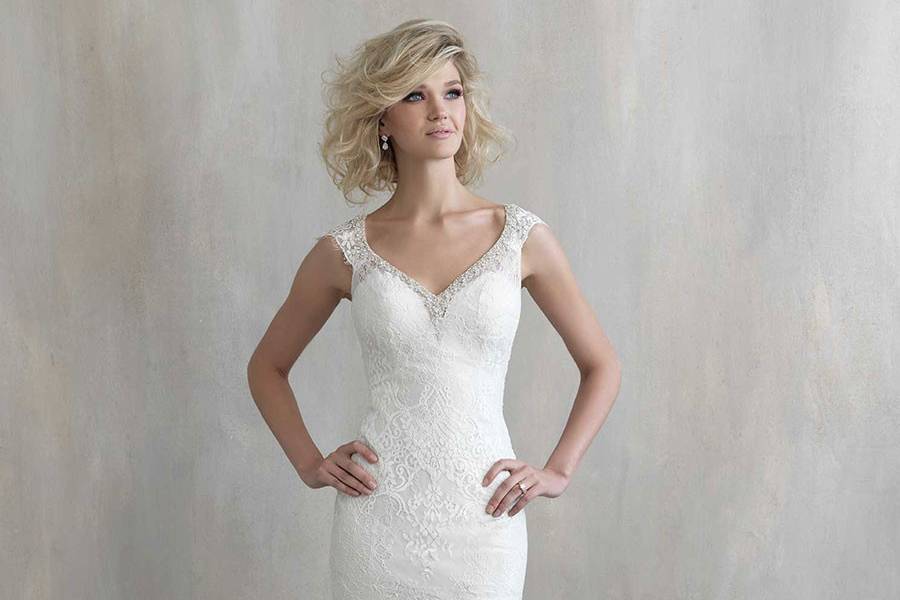 Style MJ211 <br> This form-fitting sheath is topped with a simple neckline and eyelash lace cap sleeves.