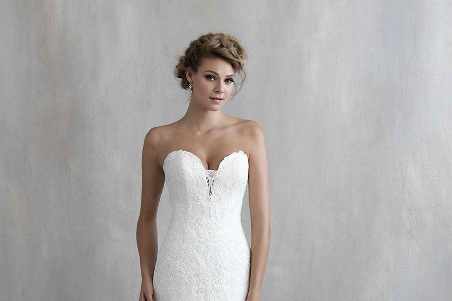 Style MJ213 <br> Dreamy ruffles and lace marry perfectly in this strapless gown.