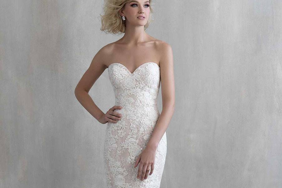 Style MJ221 <br> There is beauty in simplicity, but we can't resist a little sparkle — so we wove sequins into the lace of this barely-flared column gown.