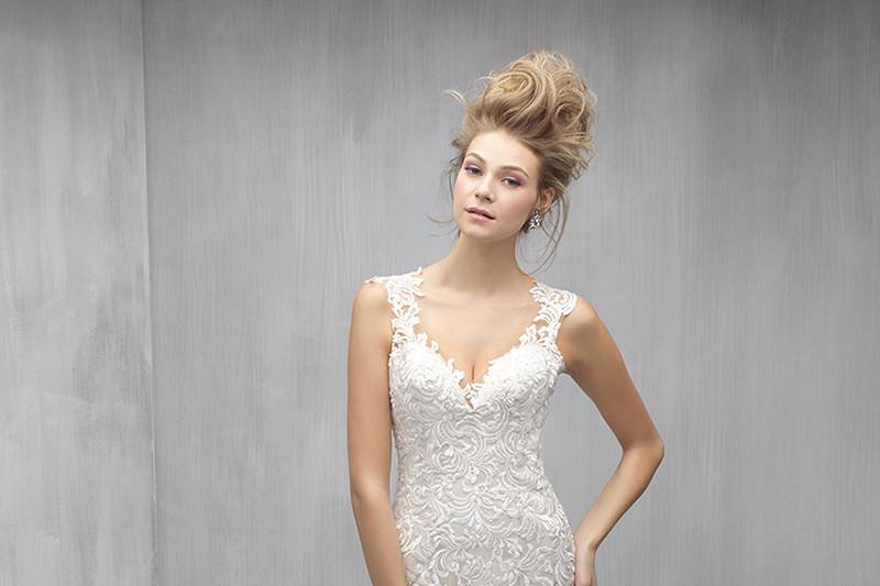 Style MJ259 <br> This richly embroidered strapless gown is paired with a soft tulle skirt and hem lace.