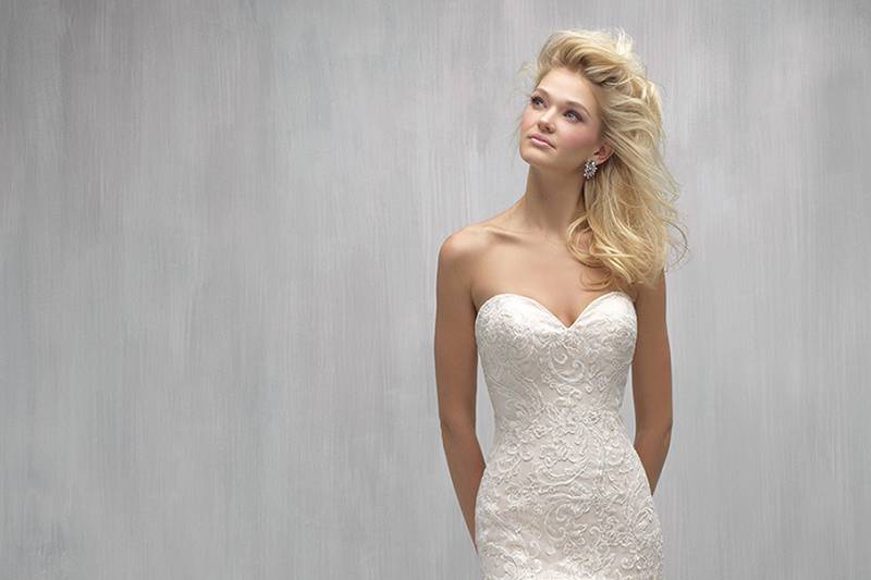 Style MJ265 <br> A strapless bodice with clear sequin accents leads to multilayered ruffles and a sweeping train.