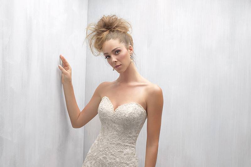 Style MJ251 <br> A high neckline and fitted bodice weave a flattering fit, while crystal patterns add a little sparkle to this gown, along with clear sequin accents.