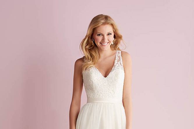 Style 2701 <br> On this strapless ballgown, dreamy English net is covered with climbing floral lace appliqué and finished with a demure sweetheart neck. 