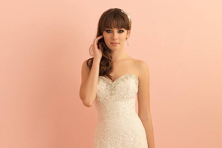Style 2850 <br> Gorgeous lace and Swarovski crystals adorn this exquisite gown. 