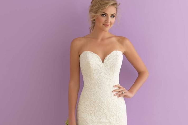 Style 2906 <br> Striking yet subtle, this fit-and-flare strapless gown features a gorgeous train and scalloped edging. 
