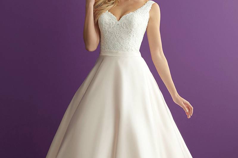 Style 2951 <br> This ballgown's satin skirt is paired with a sleeveless lace bodice, and complemented with clear sequin along the bodice for a subtle touch of sparkle.