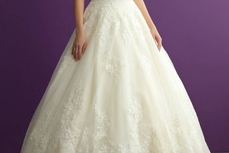 Style 2959 <br> This strapless ballgown is adorned with lace appliques and a sweet scalloped neckline.
