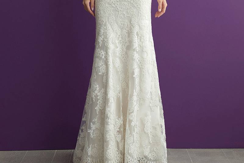 Style 2960 <br> Vintage-inspired lace is featured along the bateau neckline and V-back of this sheath bridal gown.