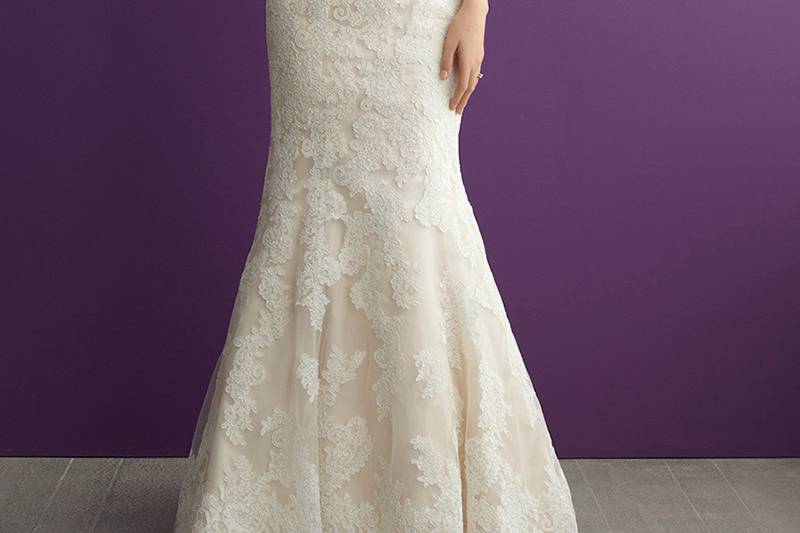 Style 2962 <br> In this slim, A-line gown, cntrasting textures meet at a beaded belt.