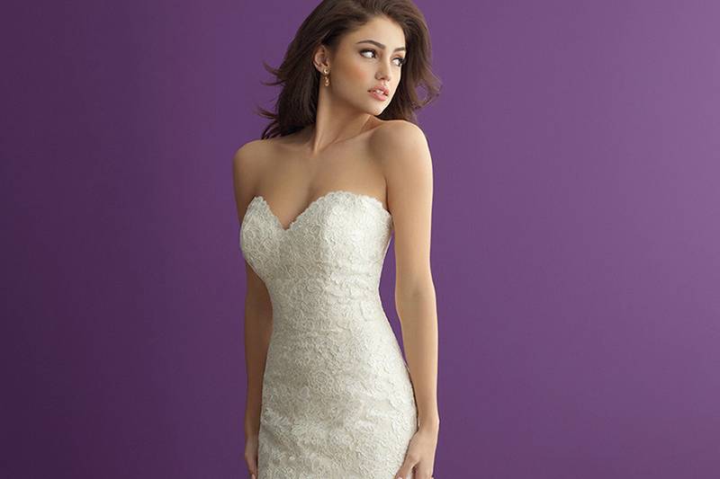 Style 2964 <br> Softly layered ruffles compose the skirt of this strapless mermaid gown.