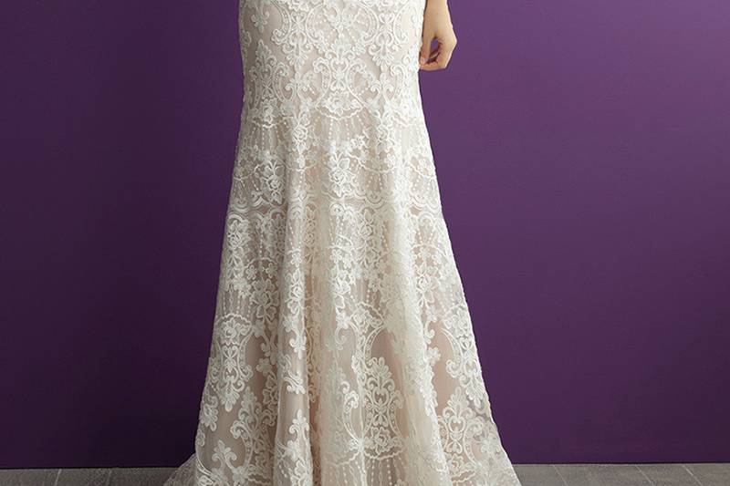 Style 2965 <br> Just above the knee, this structured lace gown flares to a gorgeous tiered train.