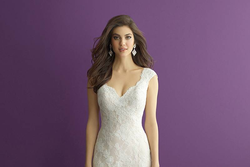 Style 2968 <br> The highlight of this gorgeous lace gown is its unique train, for a stunning walk down the aisle.