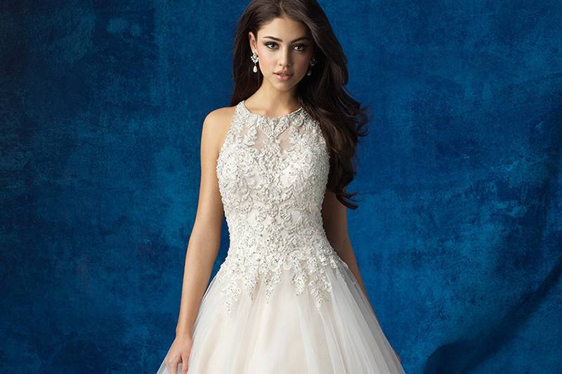 Style 9358 <br> If you live for ruffles but want minimal volume, this column gown is a dream come true.