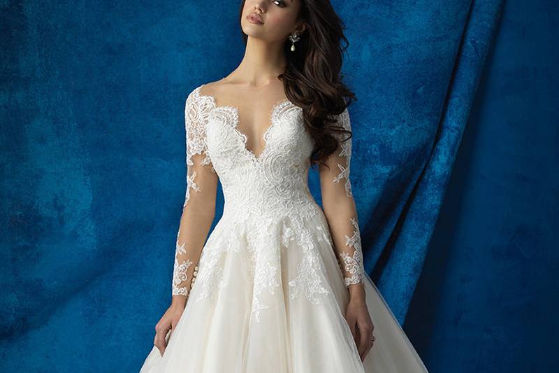 Style 9365 <br> Textured lace appliques elevate this strapless gown into a thing of beauty.