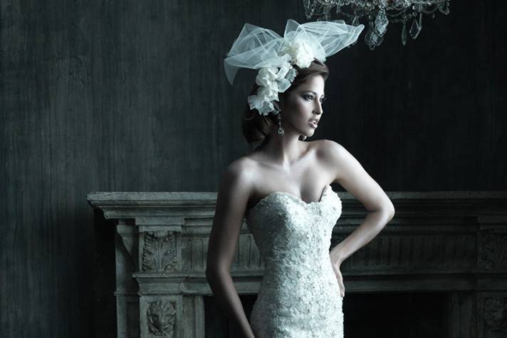 C417	<br>	Gorgeous ruffles add volume and texture to this strapless ballgown.