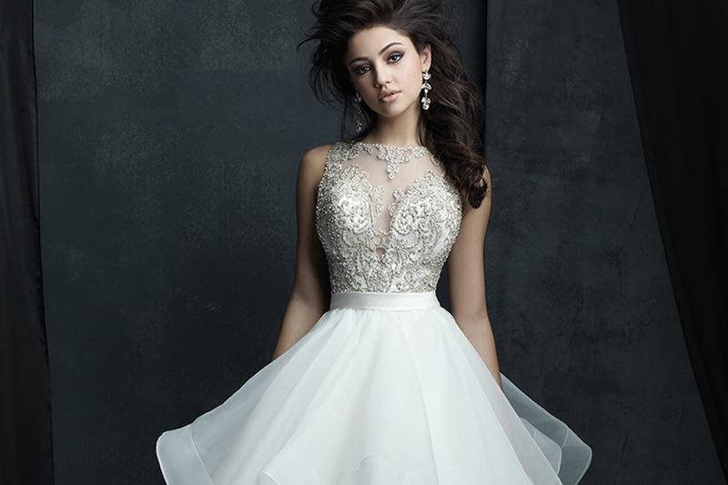 Style C380F <br> Decadent ruffles and crystal beadwork adorn this striking ballgown.