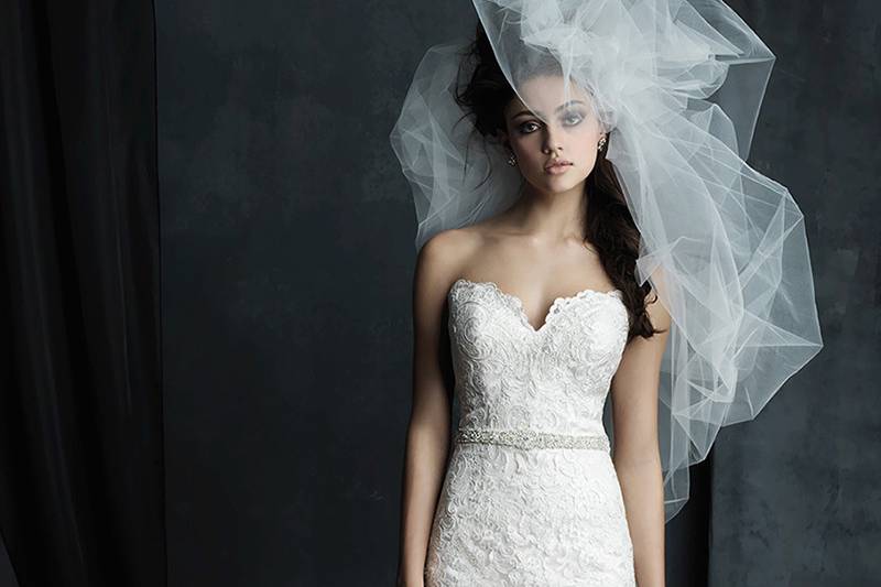 Style C387F <br> This strapless lace gown features a gorgeous detachable train.