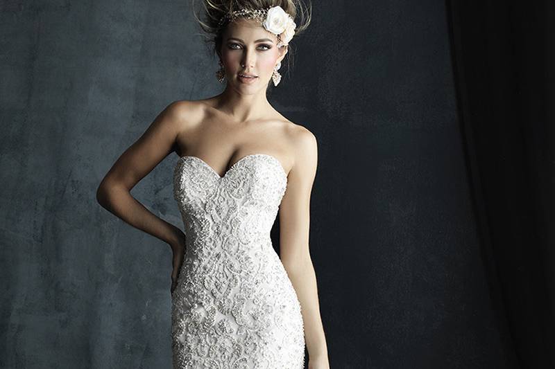 Style C389F <br> This ruffled gown hugs your curves and sparkles with intricate Swarovski beadwork.