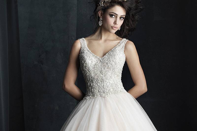 Style C390F <br> A classic ballgown — beaded on top and paired with layers of delicate tulle.