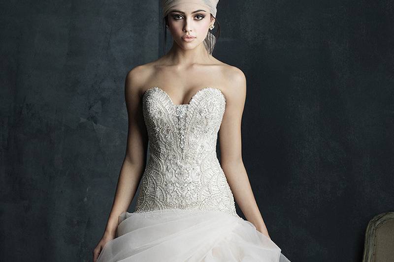 Style C393F <br> Swirled and gathered tulle is the highlight of this incredible couture ballgown.