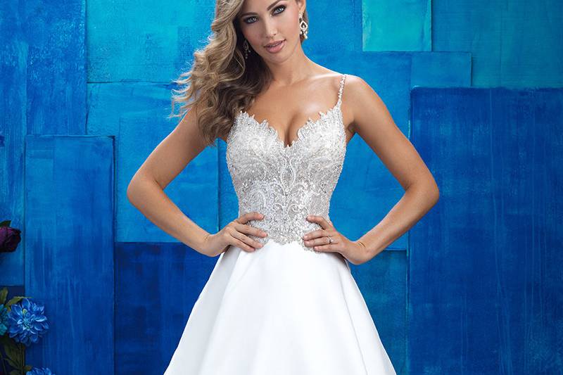 9404	<br>	This ballgown features an intricately beaded, opulent bodice, destined to make the bride sparkle.