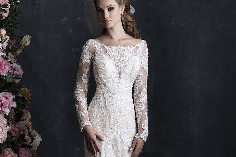 C406	<br>	Sheer lace overlays the deep sweetheart neckline of this sleeved sheath.
