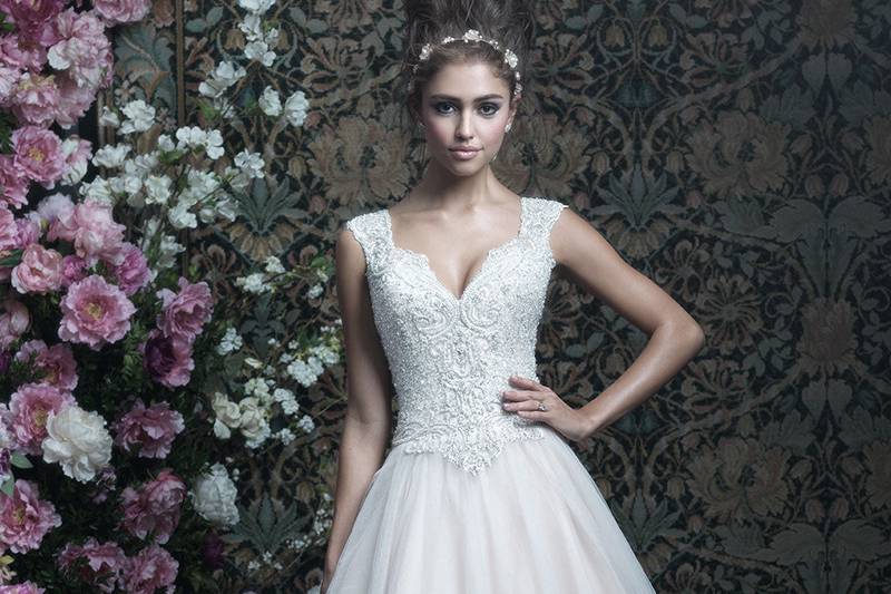 C406	<br>	Sheer lace overlays the deep sweetheart neckline of this sleeved sheath.