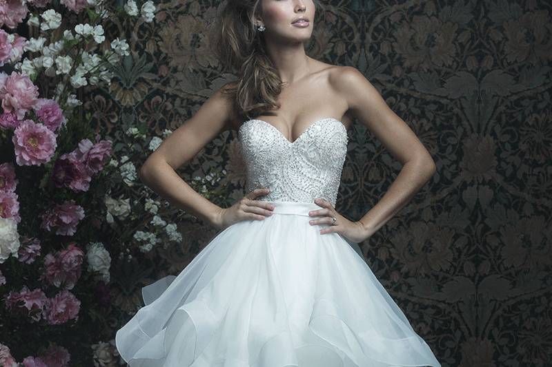 C417	<br>	Gorgeous ruffles add volume and texture to this strapless ballgown.