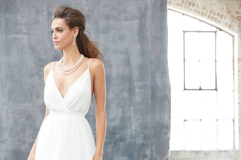 Style MJ313		Chic and minimalist in its approach, this gown is your ideal destination wedding dress.
