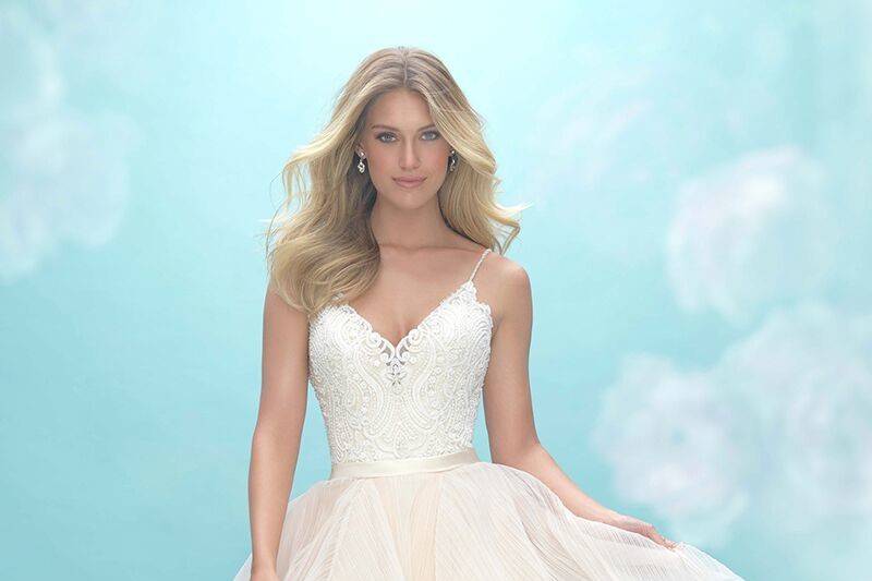 Allure Bridals	9450	<br>	Airy, textured ruffles comprise the skirt of this delicate ballgown.