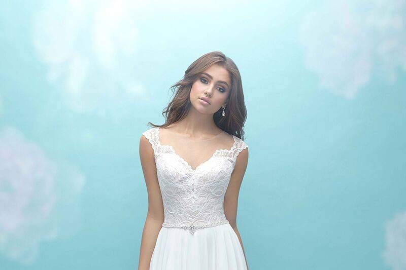 Allure Bridals	9467	<br>	The illusion neckline and back of this A-line dress are topped with delicate lace applique.