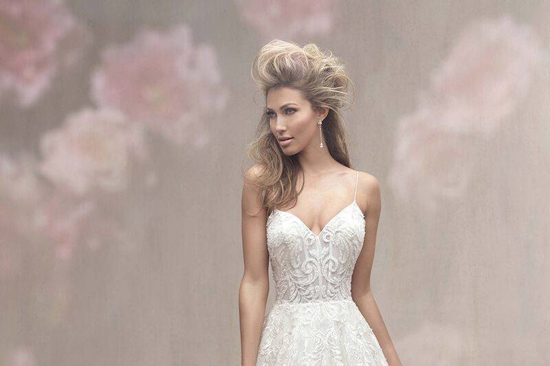 Allure Couture	C453	<br>	This chic strapless gown features crosshatched embroidery, lace and subtly sparkling beadwork.