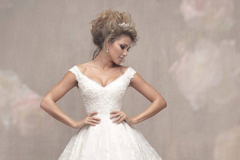 Allure Couture	C456	<br>	Side panels add dimension to this romantic, floral lace ballgown.