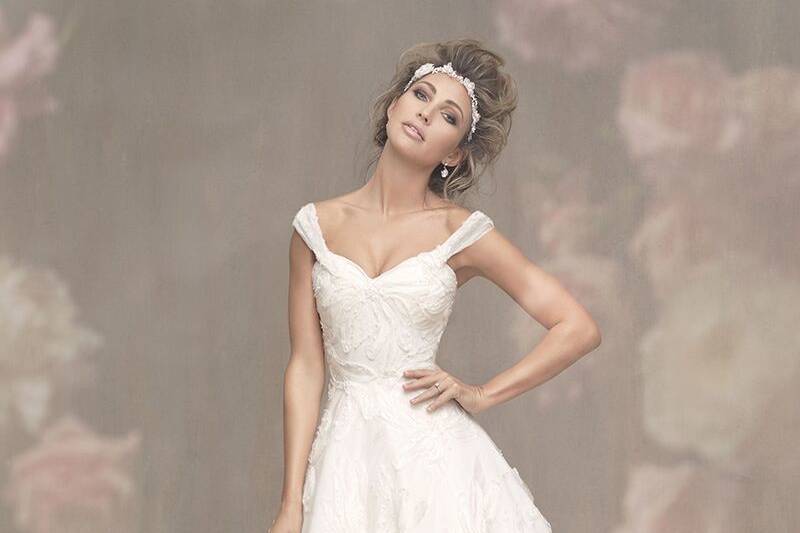 Allure Couture	C464	<br>	Embroidered tulle blooms grant a softly lustrous quality to this cap sleeved ballgown.