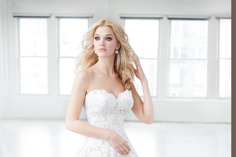 Madison James	MJ354	<br>	This strapless ballgown features rose-patterned lace across the bodice and hemline.