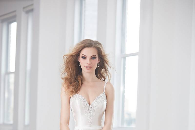 Madison James	MJ366	<br>	This pearlescent silk Mikado gown is topped with crystal beading along the neckline and paired with a detachable train.