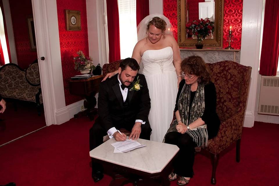 Signing the marriage license