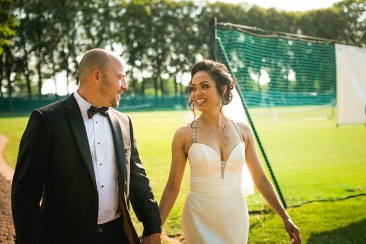 Couple by a soccer field