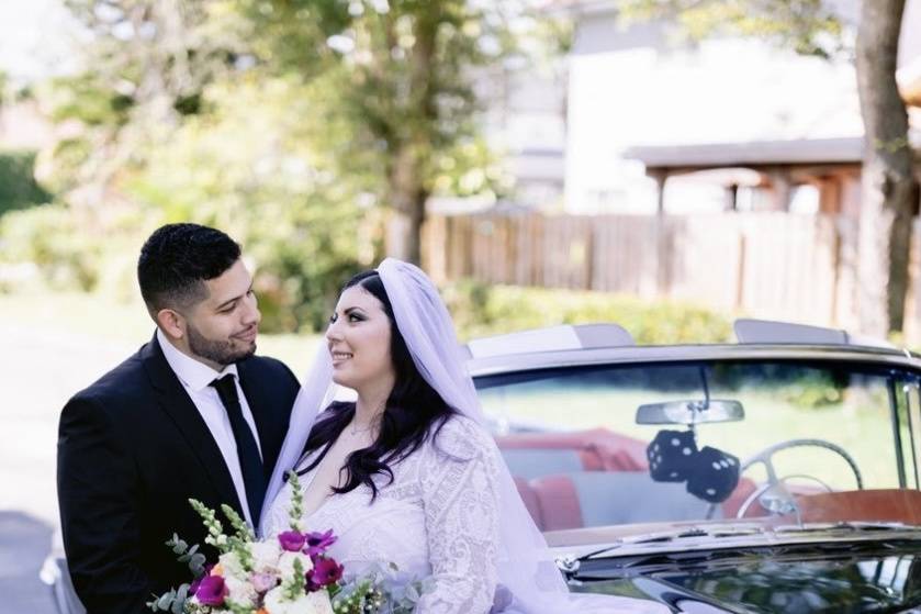 A couple and their car.