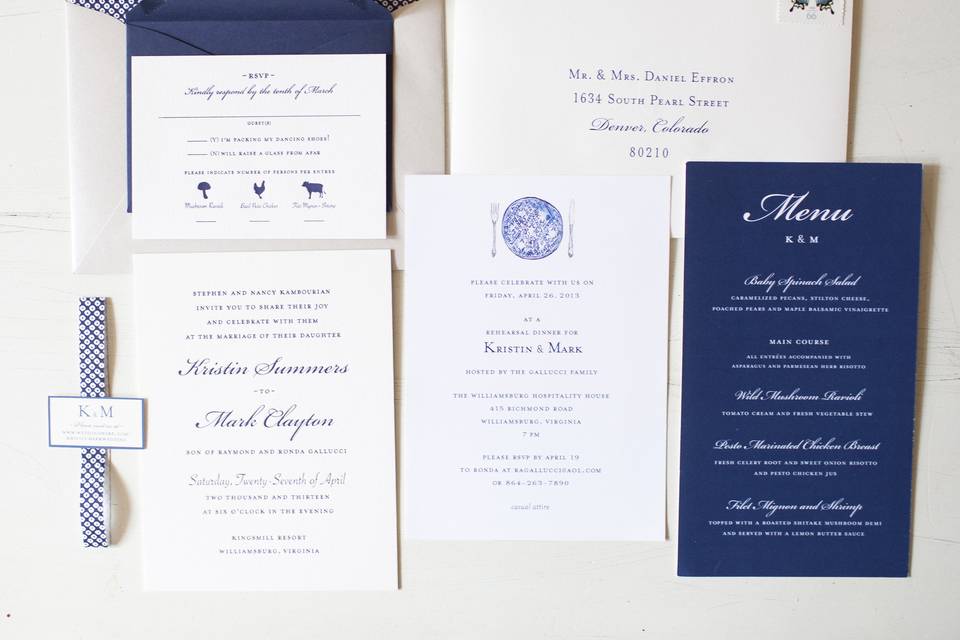 The idea for the wedding was a classic but casual outdoor affair steeped in Southern elegance. We adapted a beautiful navy and white letterpress theme and added personal details throughout. A gorgeous French paper was used for the envelopes liners and we fashioned a beautiful band to tie it all together. Response cards had custom illustrations to represent meal choice, and incorporated the couple’s sense of fun into the wording to portray their personal voice.