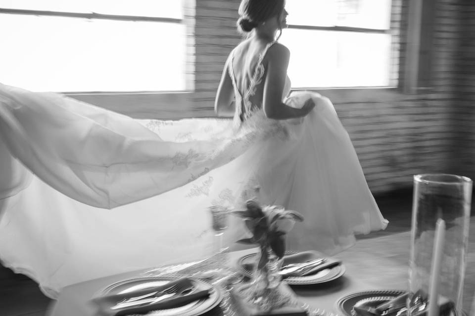 Bride in brick ballroom