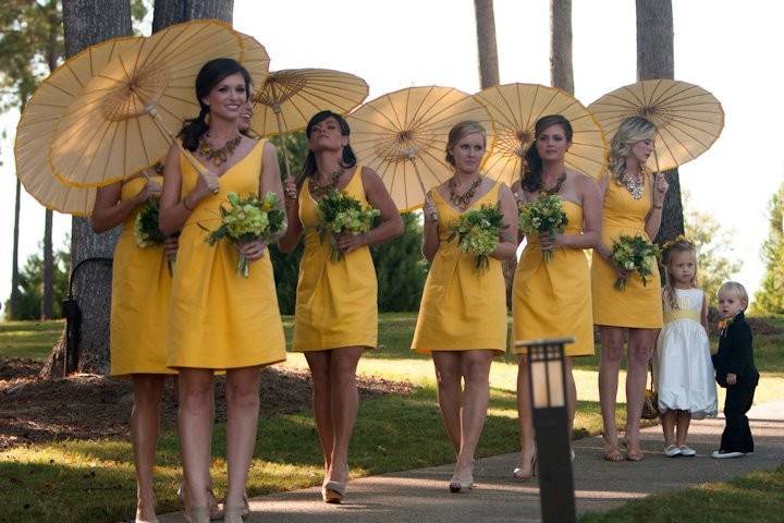 Bridesmaids and their parasols