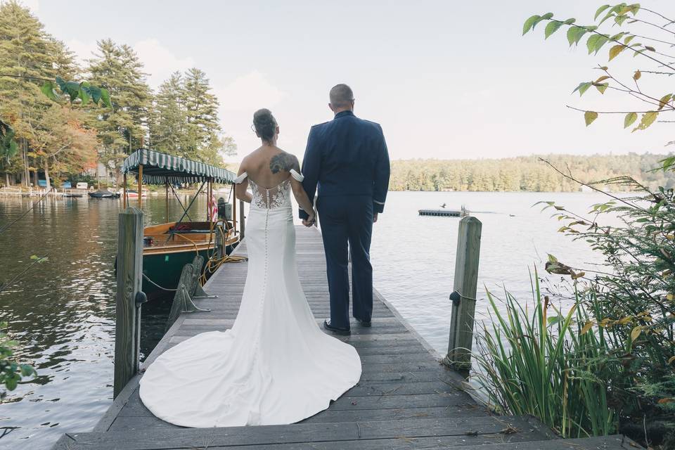 Bride and groom at the boat