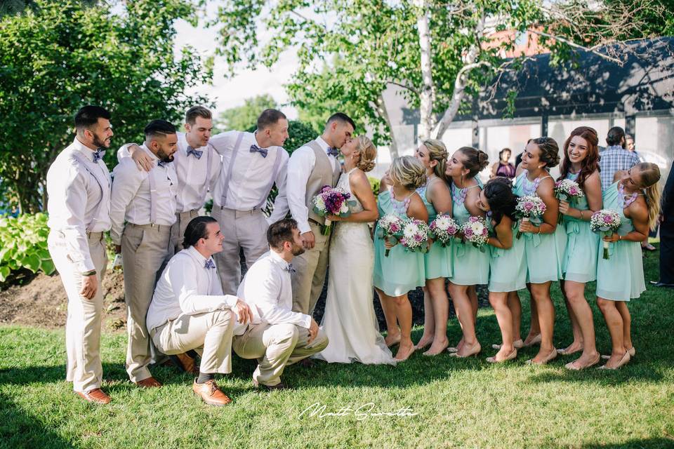 Newlyweds and their wedding party