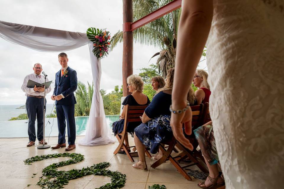 Groom seeing bride first time.