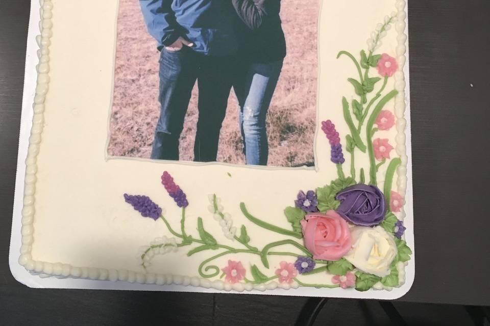 Perfect engagement party cake with edible photos from the actual engagement!